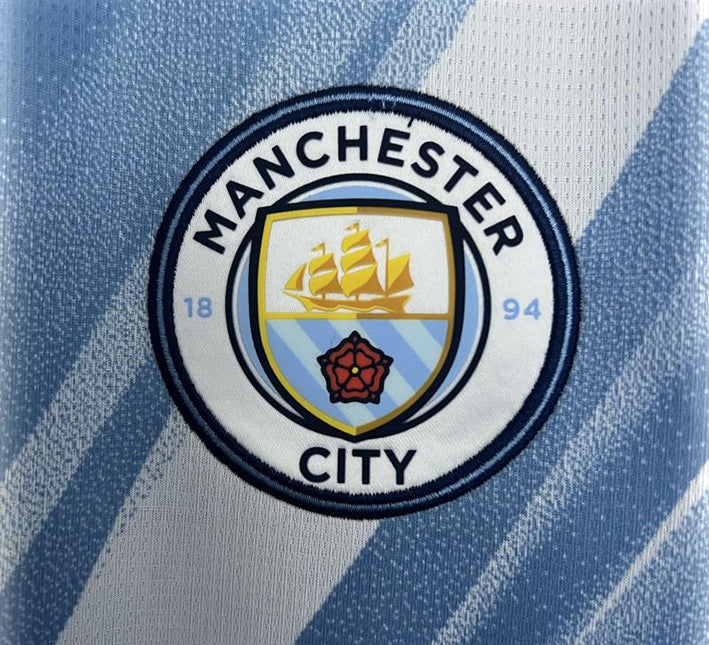 koszulka Manchester City błękitna z herbem klubu domowa