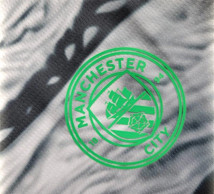 T-shirt piłkarski Manchester City design koncept czarno-szary dla kibica