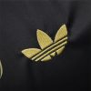 maillot-concept-real-madrid-motif-dragon-dore-edition-2425 Maillot concept Real Madrid motif dragon doré édition 2425