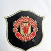 strój piłkarski Manchester United czerwony model wyjazdowy vintage