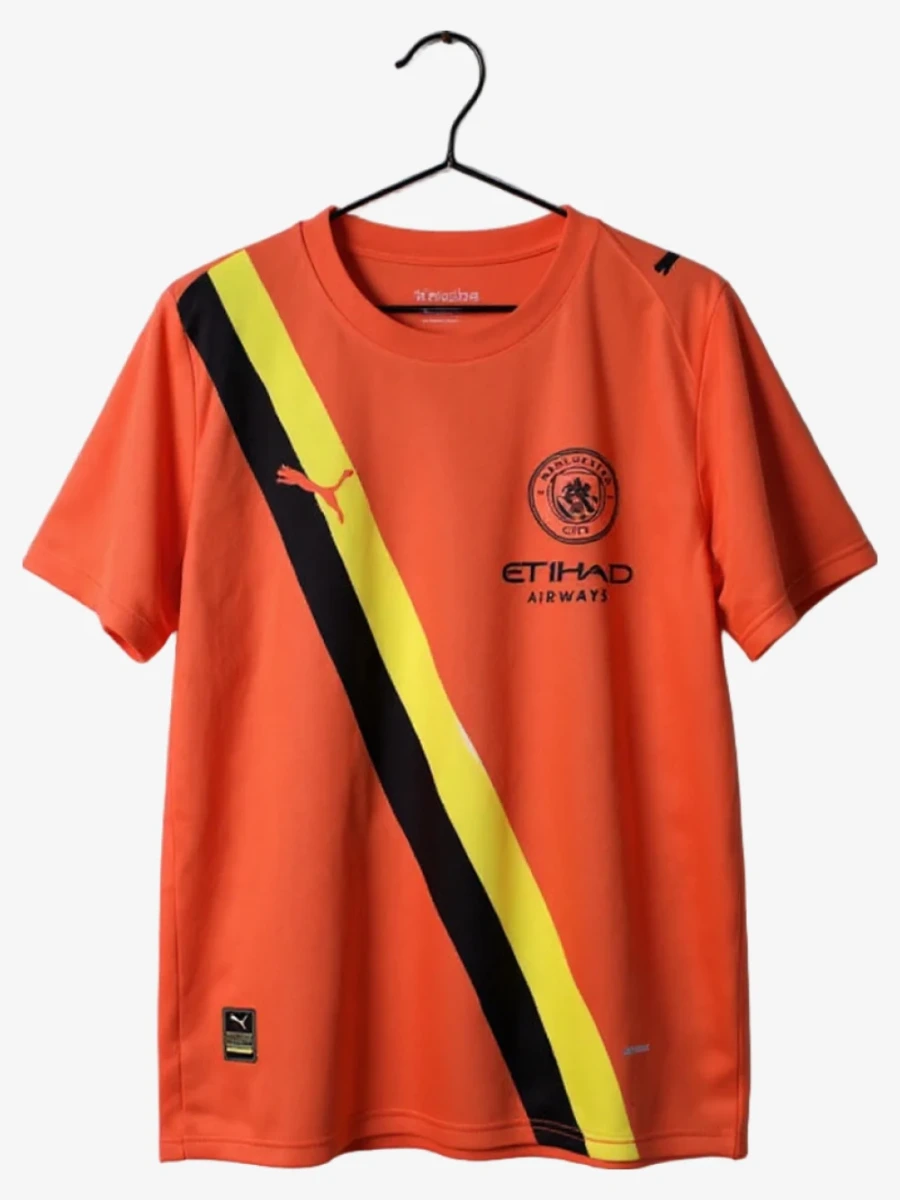 maillot-manchester-city-third-orange-2025-2026 studio v12 Koszulka Manchester City Trzecia Pomarańczowa 2025-2026